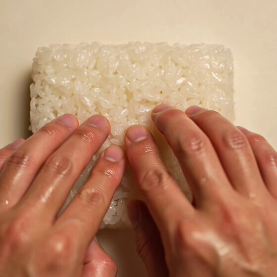 Sushi Chef Preparing Nigiri