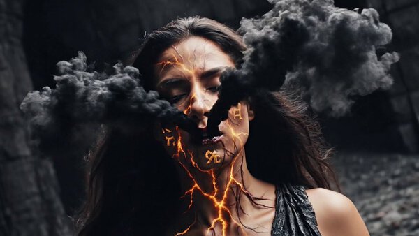 Camera Spirals Inward Face Smoke Runes