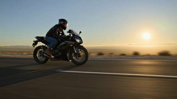 Motorcycle Desert Dawn Tracking Shot
