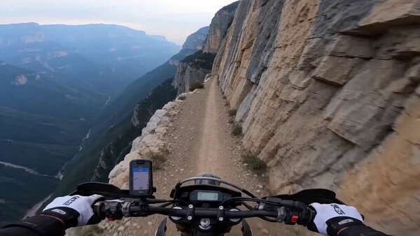 First-Person Motorcycle POV Cliffside Path