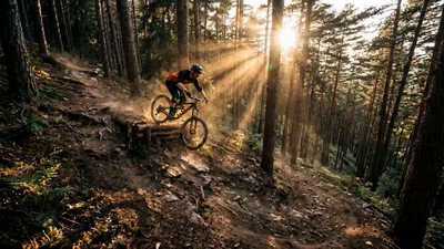 Female Mountain Biker Forest Downhill Backflip